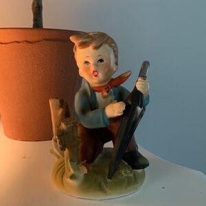 Erich Stauffer porcelain figurine S8517 Outing Boy with umbrella kneeling‎